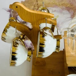 Golden Winged Haven (set of six cups and saucers, teapot, wooden stand)