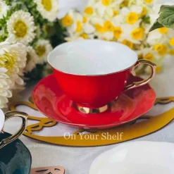 The Plain Red Teacups and Saucers