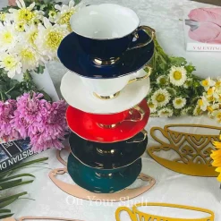 The Plain Red Teacups and Saucers