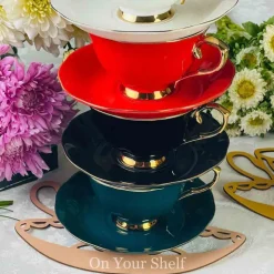The Plain Red Teacups and Saucers