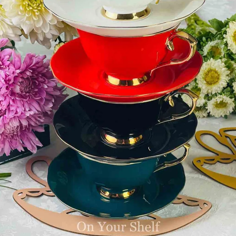 The Plain Red Teacups and Saucers