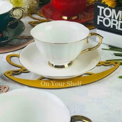 The Plain White Teacups and Saucers
